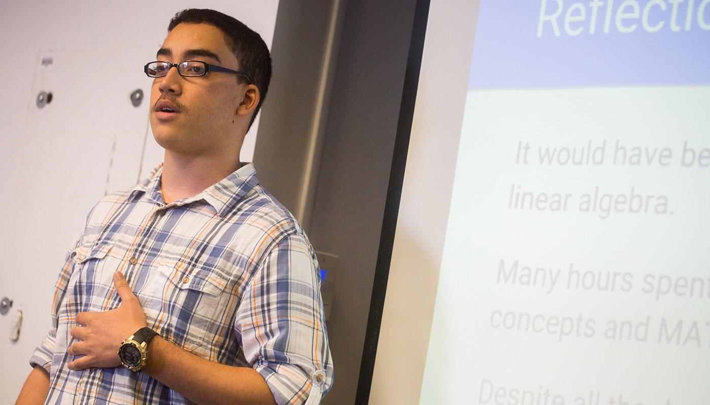 Engineering the Next Generation member presenting his research. Photo Credit: Tim Lee Engineering the Next Generation member presenting his research.