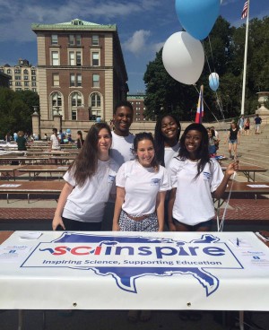 Sci-Inspire Members at the student activities fair. Photo Credit: Outreach Programs Staff Sci-Inspire Members at the student activities fair