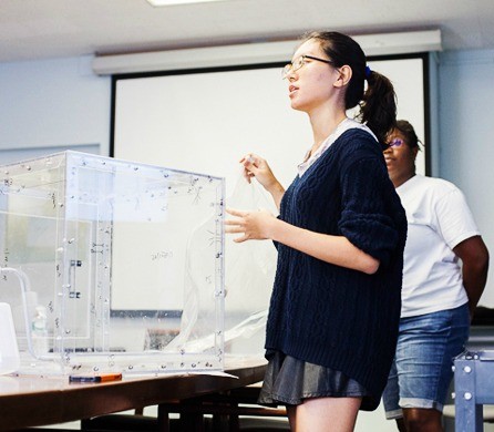 An Engineers Without Borders student conducts a presentation. Photo Credit: Outreach Programs Staff An Engineers Without Borders student conducts a presentation.