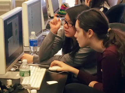 GWC students collaborate on a coding project