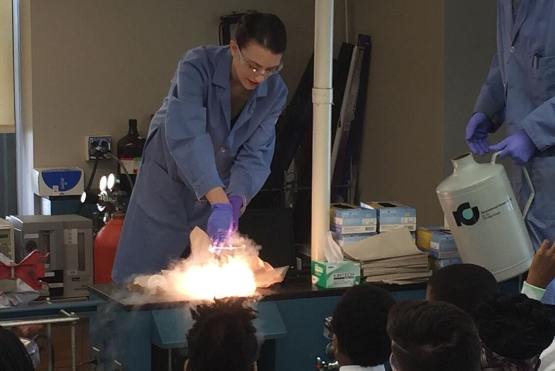 Demonstration on combustion. Photo Credit: Outreach Programs Staff March Materials Madness